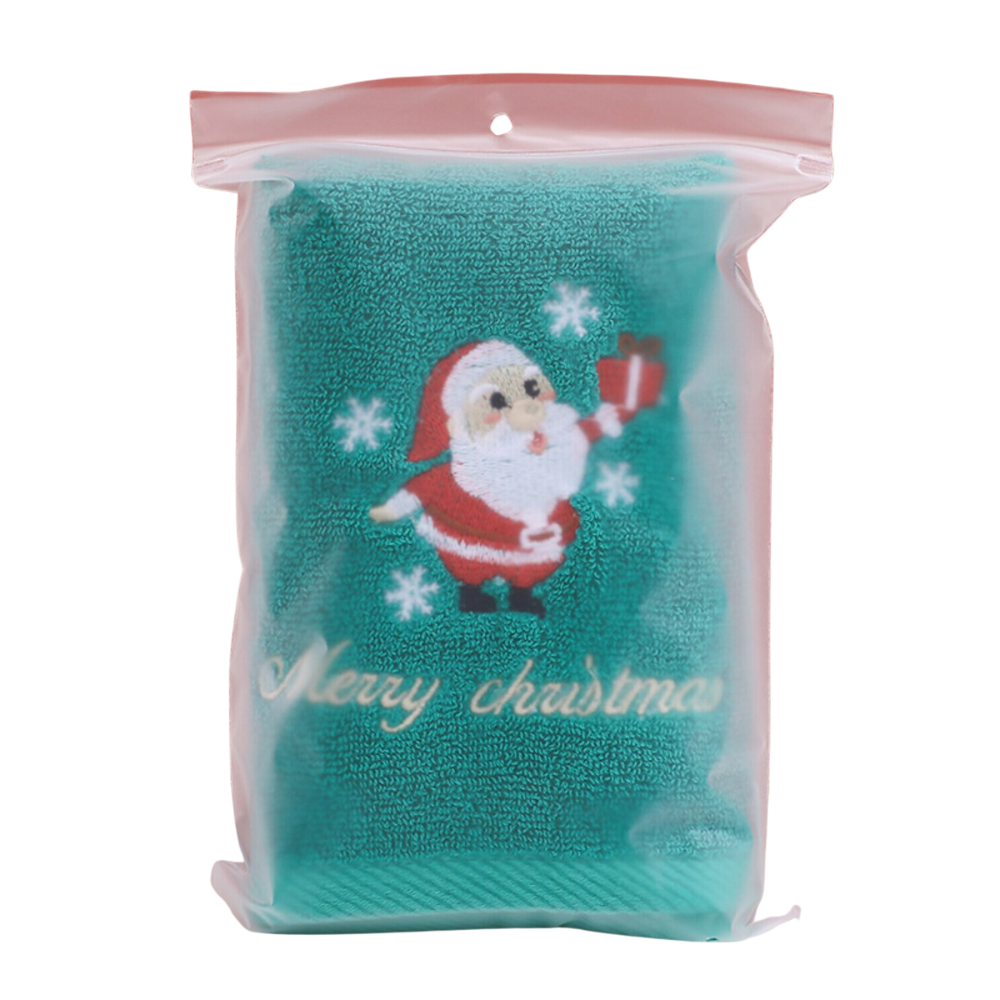 Green Christmas Baby Towel With Embroidered Santa Clause Design Packed In A Zip Lock Plastic Bag In A White Background