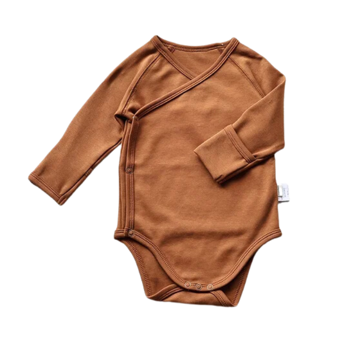 Brown baby long sleeve bodysuit in a white background