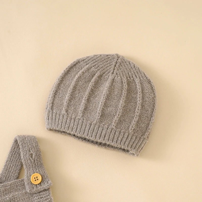 Dark Khaki Baby Knitted Hat in a beige background