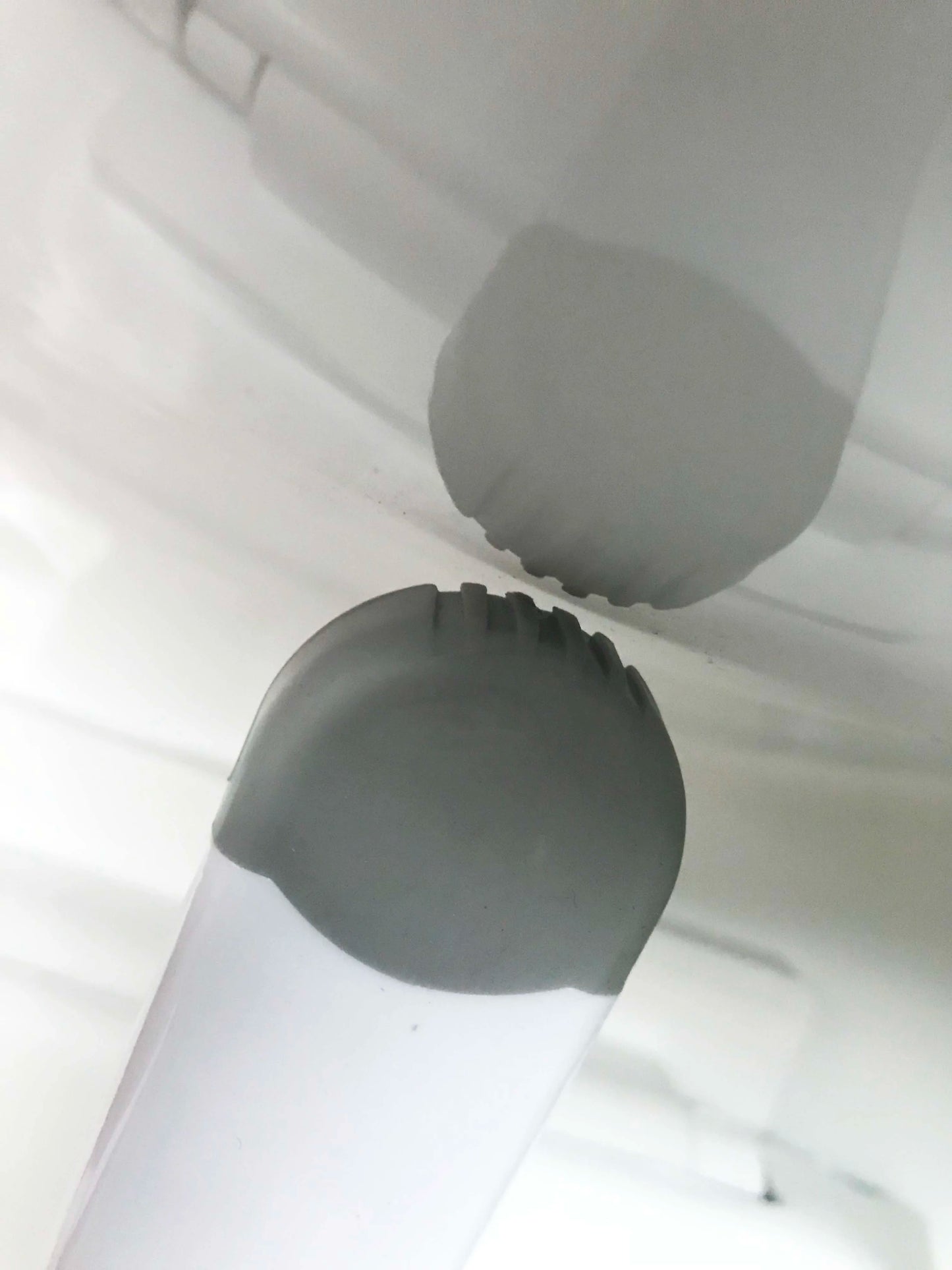A Close Up View Of The Tip Of Toilet Lock