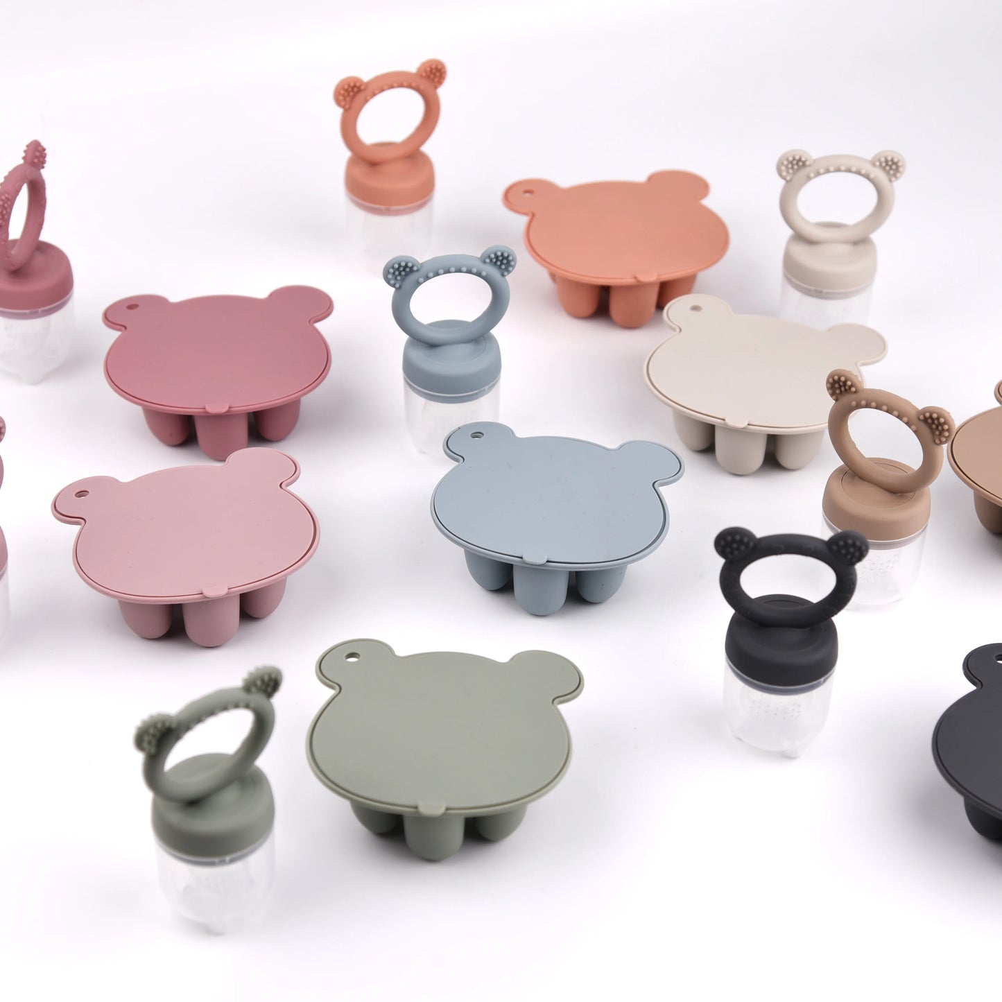 Assorted animal-shaped silicone suction bowls in various colors on a white background.