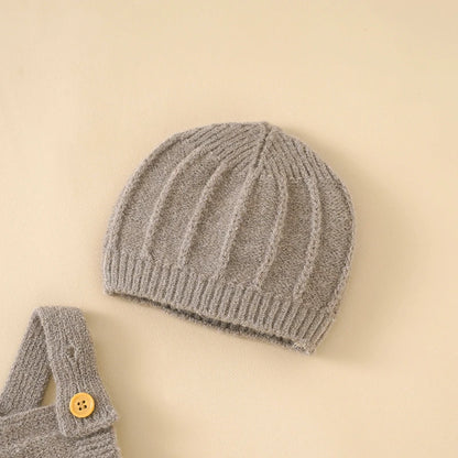 Dark Khaki Baby Knitted Hat in a beige background