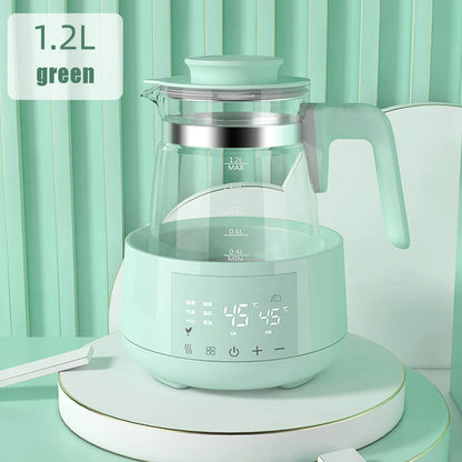 A modern 1.2L green electric tea kettle with a digital temperature display, placed on a kitchen counter.
