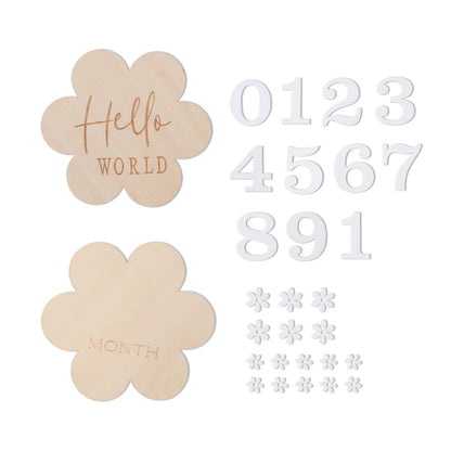 A flower shaped wooden milestone card set in a white background