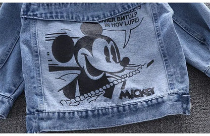 A Close Up Picture Of Mickey Mouse Toddler Blue Denim Jacket's Mickey Mouse Back Print