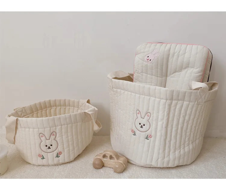Two Baby Diaper Bag Caddy Organizer With Rabbit Design In A Lifestyle Background