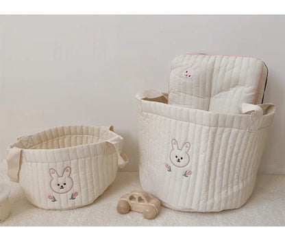 Two Baby Diaper Bag Caddy Organizer With Rabbit Design In A Lifestyle Background