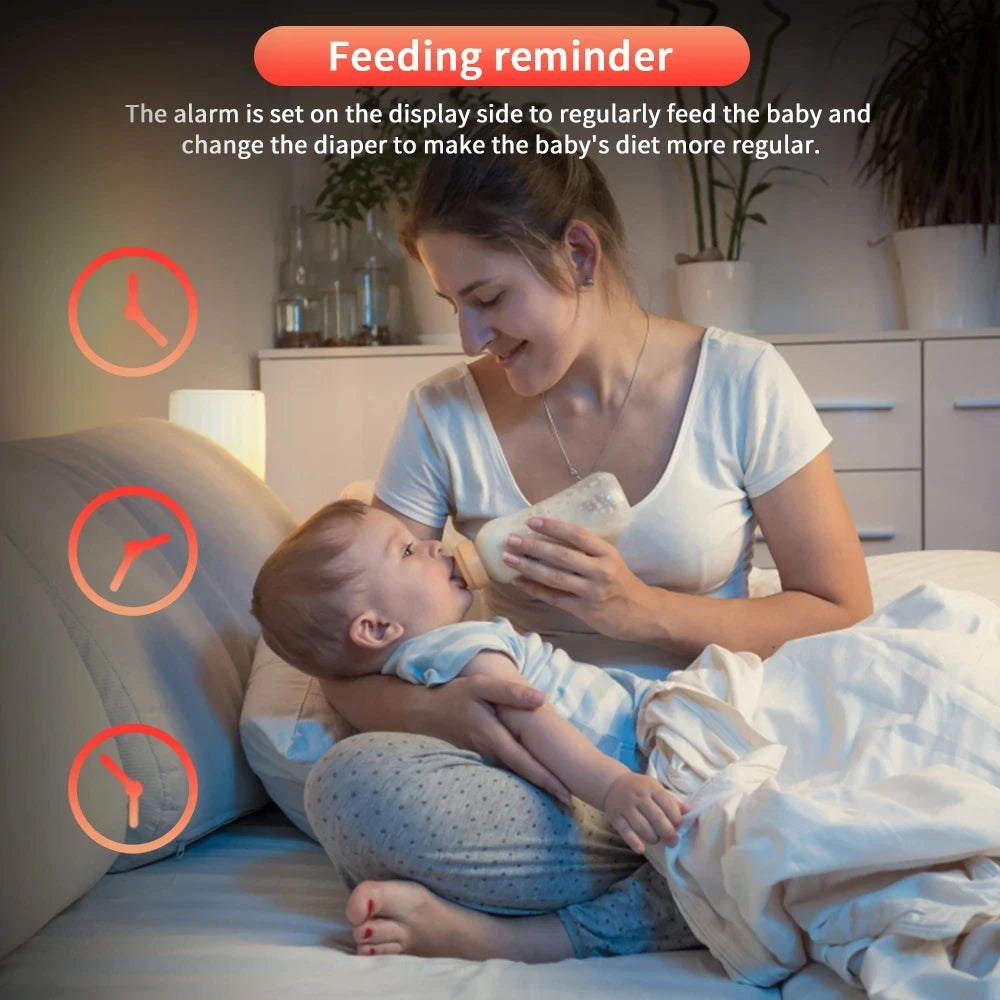 A woman cradles her baby while feeding in bed, featuring the words feeding reminder in the background