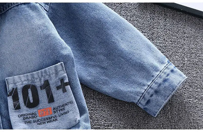 A Close Up Picture Of Mickey Mouse Toddler Blue Denim Jacket's Sleeve