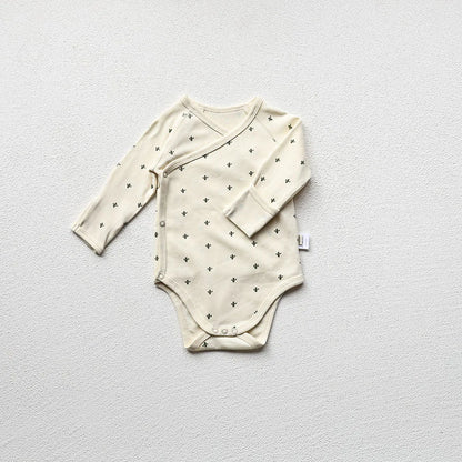 Moon Printed baby long sleeve bodysuit in a light gray background