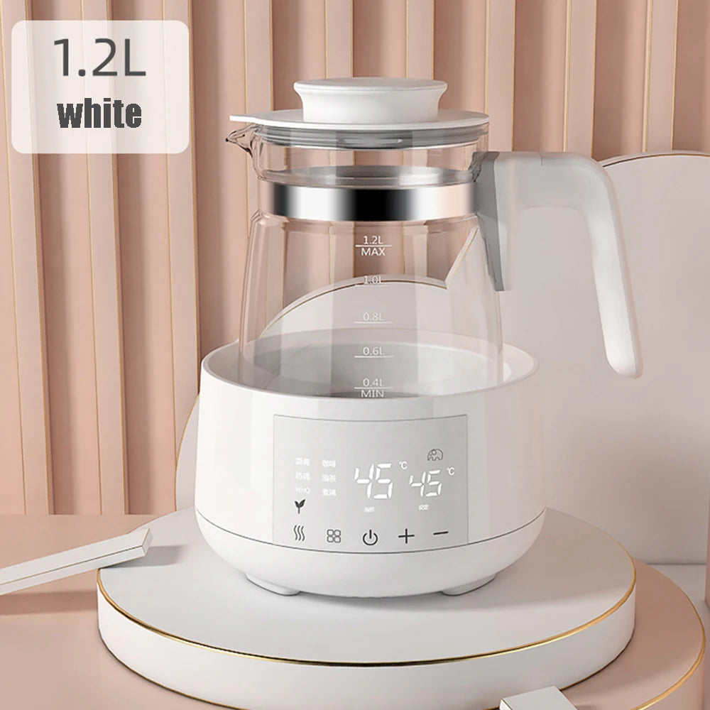 A modern 1.2L white electric tea kettle with a digital temperature display, placed on a kitchen counter.