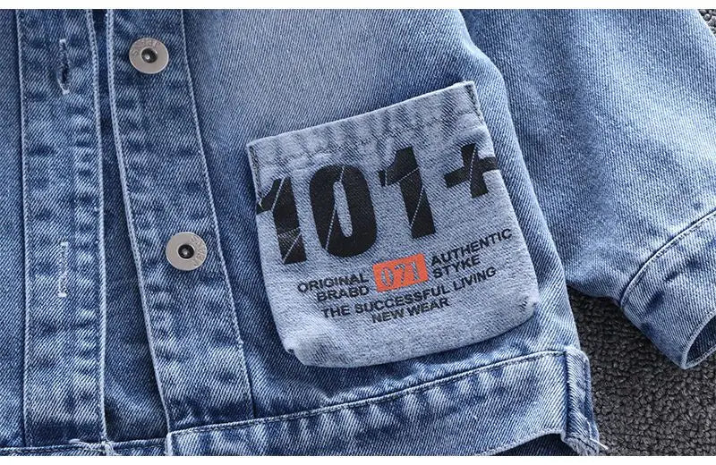 A Close Up Picture Of Mickey Mouse Toddler Blue Denim Jacket's Hand Pocket