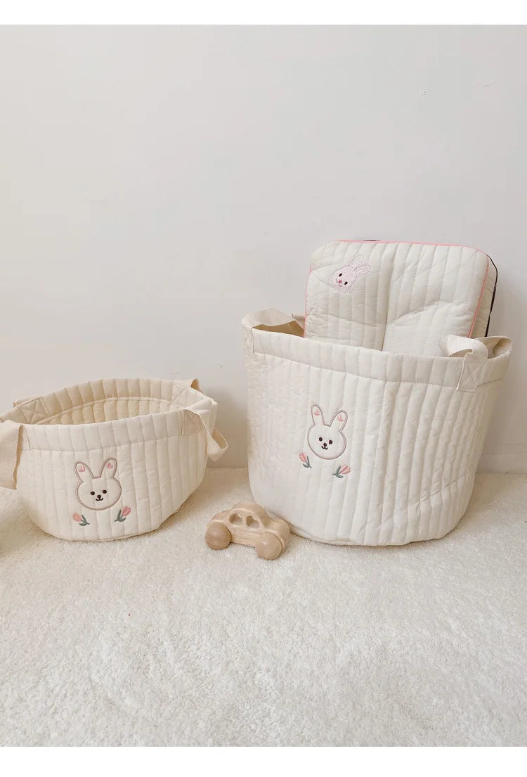 Small And Large Diaper Bag Caddy Organizer With Olive Design In A White Carpet And Background