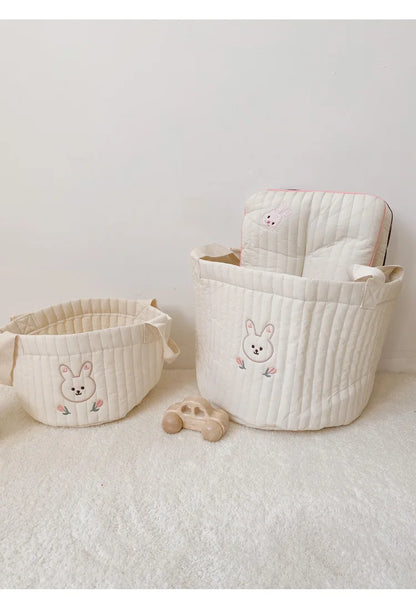 Small And Large Diaper Bag Caddy Organizer With Olive Design In A White Carpet And Background