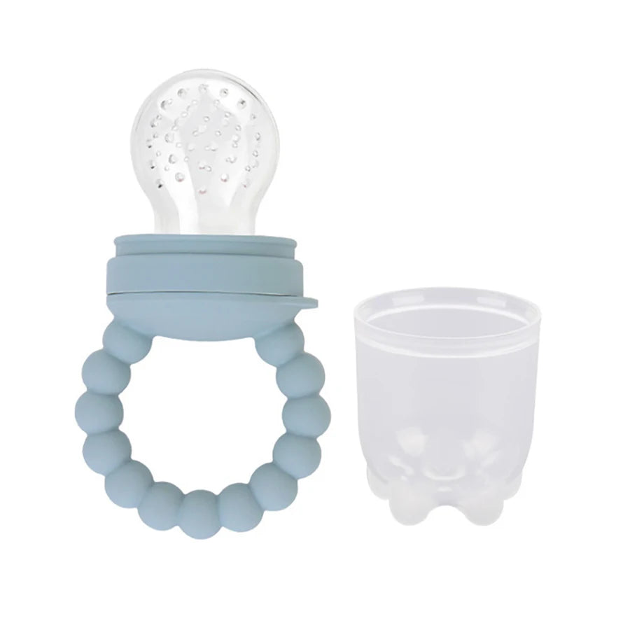 Silicone baby teether and pacifier in light blue color with a transparent cap.