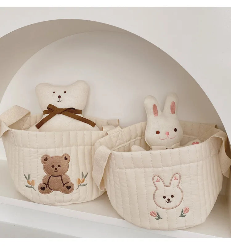 Two Baby Diaper Bag Caddy Organizer With Rabbit Design And Stuff Toy Inside On A shelf
