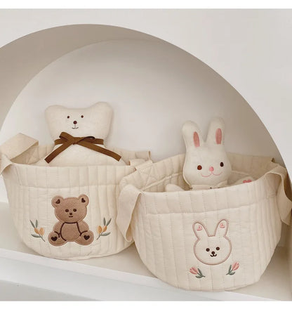 Two Baby Diaper Bag Caddy Organizer With Rabbit Design And Stuff Toy Inside On A shelf