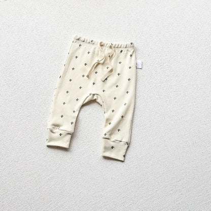 Moon Printed baby pajama pants in a light gray background