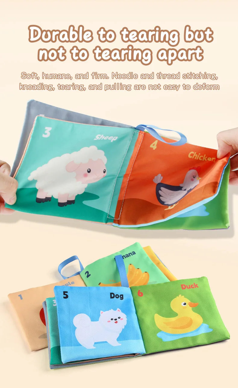 A set of colorful, durable children's cloth books with illustrations of animals like sheep and chickens.