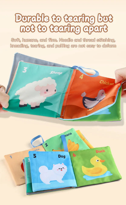A set of colorful, durable children's cloth books with illustrations of animals like sheep and chickens.